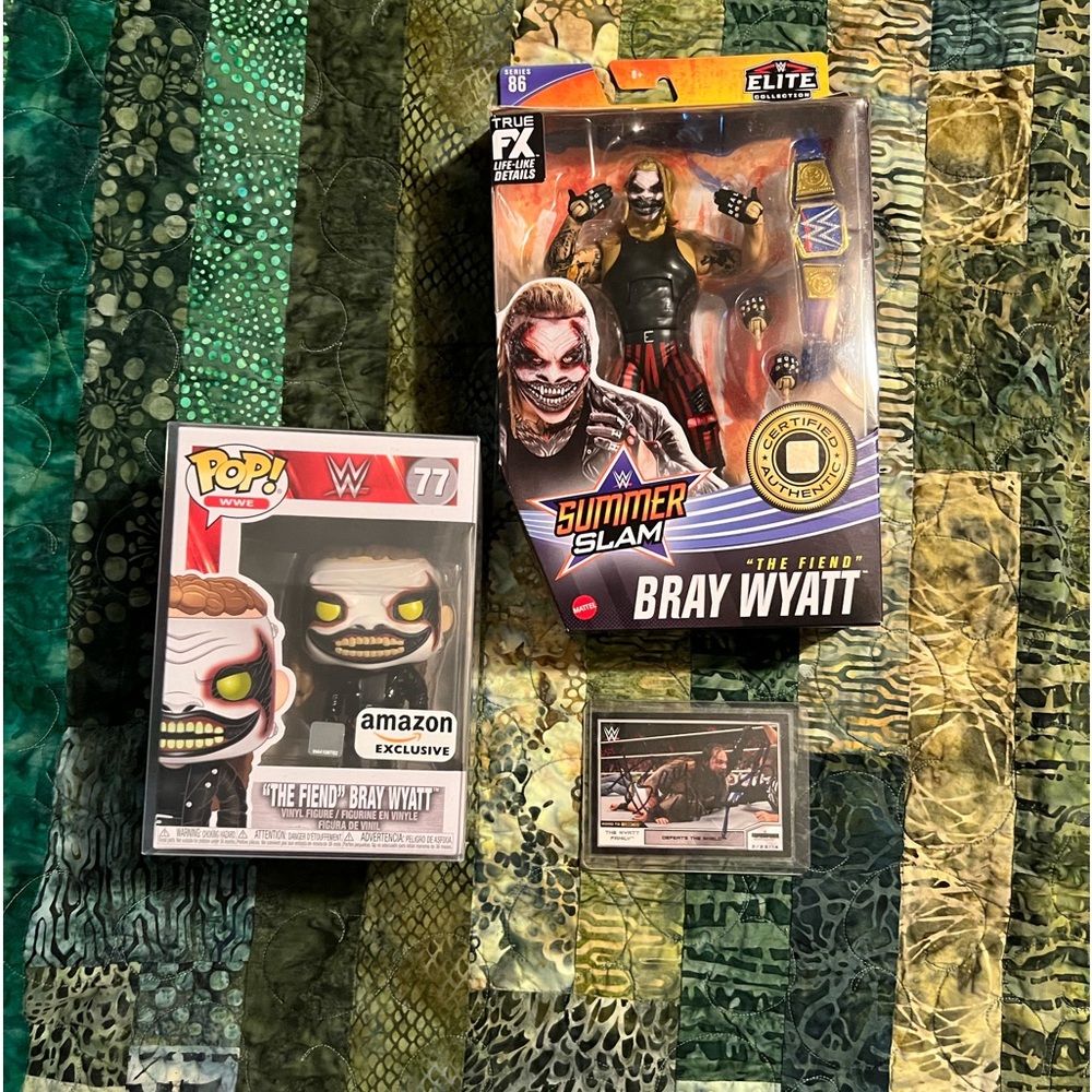 Bray Wyatt fan bundle. Funko pop, action figure, and autographed Topps card.